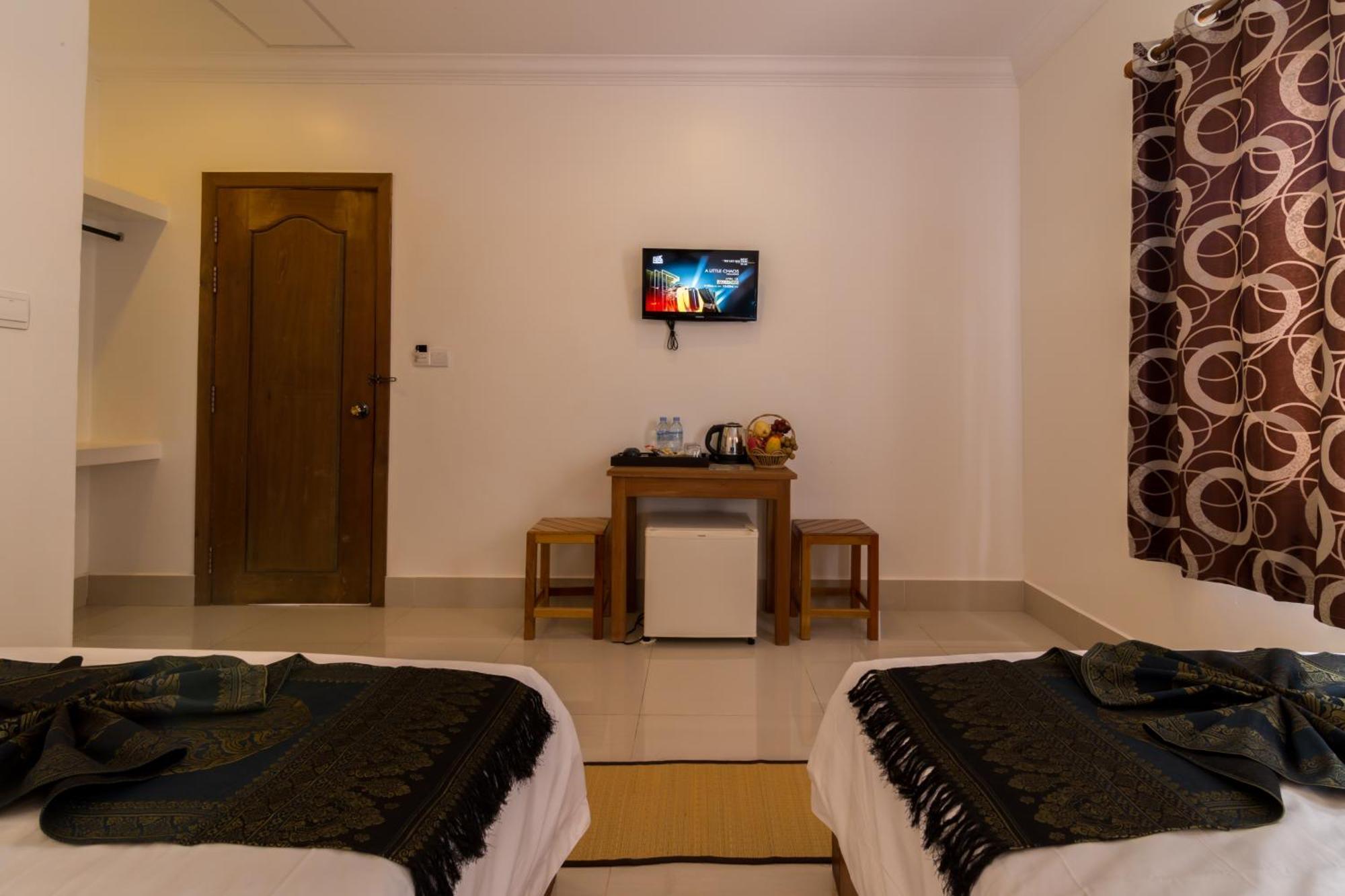 Plumeria Hotel & Spa Siem Reap Quarto foto